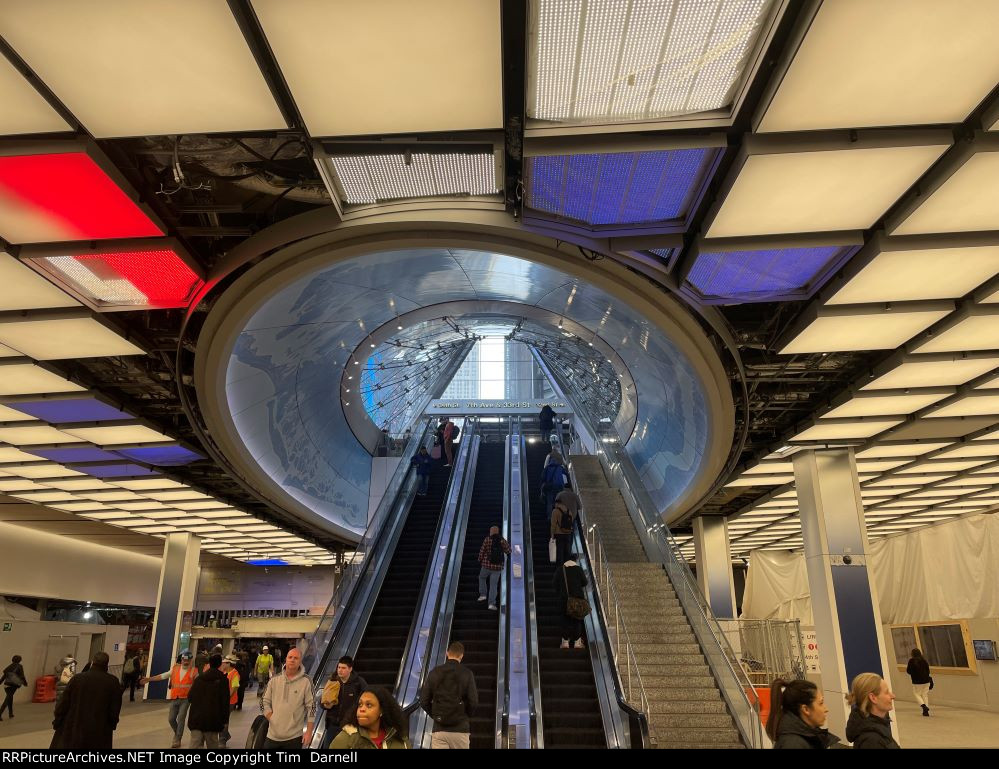 Escalator to &th Aver, 33rd St. 